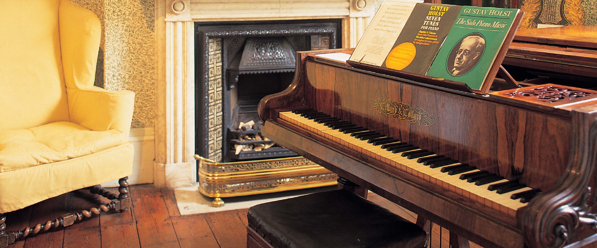 Music room piano in The Holst Victorian House