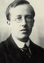 A black and white portrait of Gustav Holst as a young man